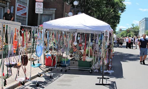 Vendor tents lining East Main Street at Best of Clinton County